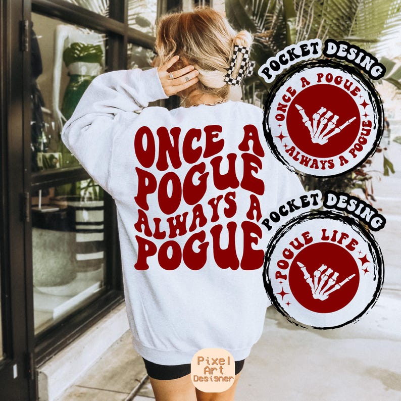 May include: White sweatshirt with red text that reads "Once a Pogue Always a Pogue". The text is in a retro font style. Two red and white pocket designs are on the sleeves. The pocket designs feature a skeleton hand with a wave gesture and the text "Once a Pogue Always a Pogue" and "Pogue Life".