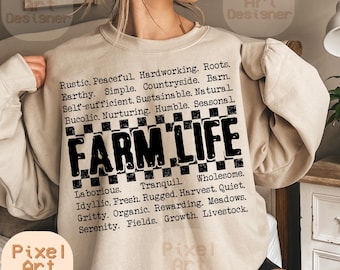 May include: A beige sweatshirt with a black and white checkered design and the text "FARM LIFE" in black. The text is surrounded by a list of words describing the lifestyle, such as "rustic", "peaceful", "hardworking", "roots", "earthy", "simple", "countryside", "barn", "self-sufficient", "sustainable", "natural", "bucolic", "nurturing", "humble", "seasonal", "wholesome", "laborious", "tranquil", "idyllic", "fresh", "rugged", "harvest", "quiet", "gritty", "organic", "rewarding", "meadows", "serenity", "fields", "growth", and "livestock".