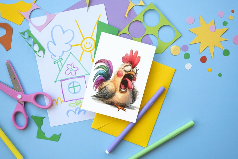 May include: A greeting card featuring a cartoon rooster with a wide open mouth, red comb, and glasses. The card is on a yellow envelope, with a drawing of a house and sun, scissors, and colorful paper cutouts on a blue background.