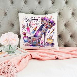 May include: White throw pillow with a colorful illustration of a high heel shoe with a crown on top. The text "Birthday Queen" is written in black script on the pillow.