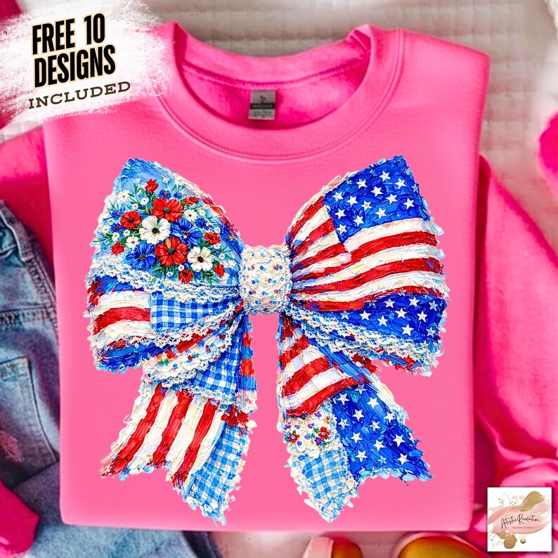 May include: A pink sweatshirt featuring a large bow design with an American flag motif. The bow incorporates red and white stripes, blue stars, and floral accents. The text "FREE 10 DESIGNS INCLUDED" is visible.