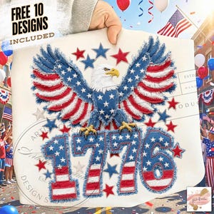May include: A patriotic design featuring a detailed eagle with outstretched wings, rendered in red, white, and blue stars and stripes. The number "1776" is prominently displayed below. The design is held up by a hand, with the text "FREE 10 DESIGNS INCLUDED" at the top.