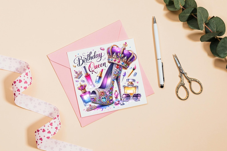 May include: A pink card with the text "Birthday Queen" in a decorative font. The card features a purple high-heeled shoe with a crown on top, surrounded by colorful jewels, perfume bottles, and makeup brushes.