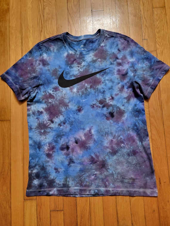turquoise and purple nike shirt