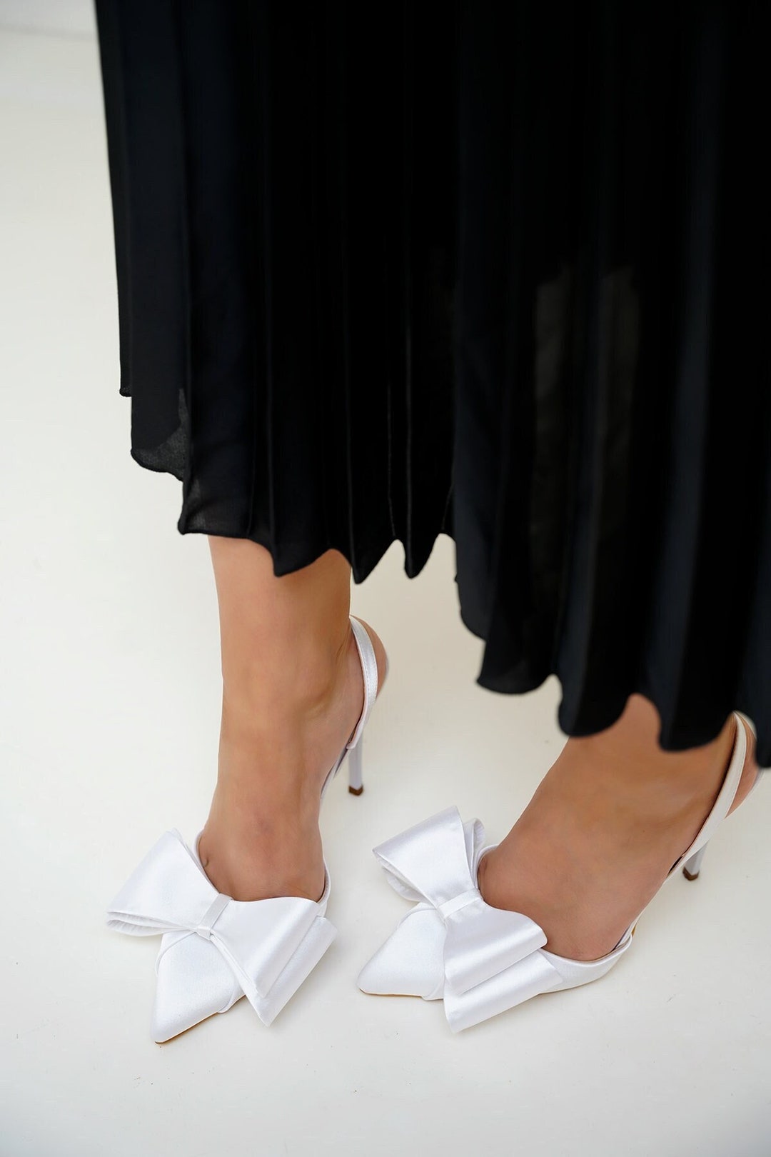 heeled trainers white
