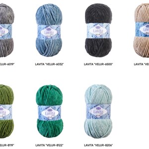 May include: Eight skeins of LaVita Velur yarn in various colors, including gray, blue, black, tan, green, and teal. Each skein is labeled with its color code. The yarn is soft and plush, ideal for knitting and crochet projects.