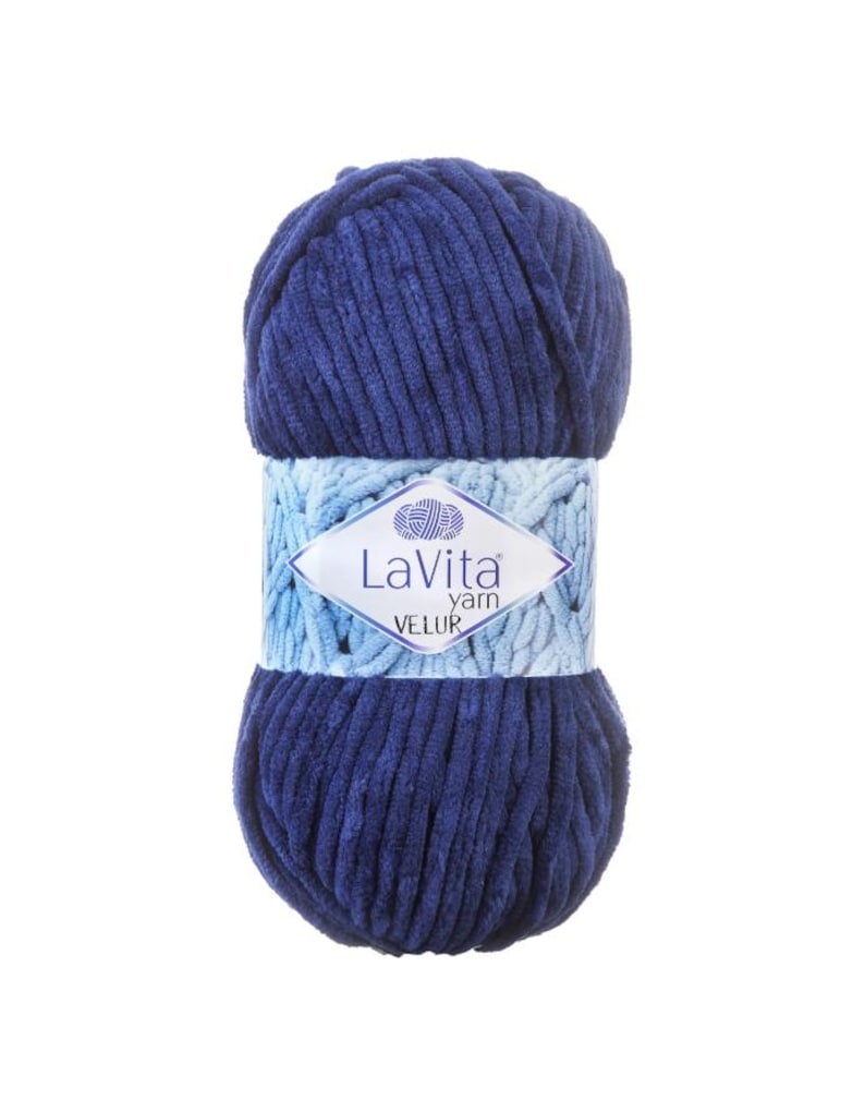May include: A ball of navy blue LaVita Velur yarn. The yarn is a soft, plush material with a ribbed texture. A light blue and white label wraps around the center of the yarn ball, displaying the brand name and product type.