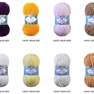 May include: Eight skeins of Lavita Velur yarn in various colors, including purple, yellow, light pink, brown, white, and light yellow. Each skein is labeled with its color code. The yarn is wrapped with a blue and white label.