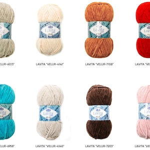May include: Eight skeins of La Vita Velur yarn in various colors, including beige, orange, red, teal, brown, and pink. Each skein is wrapped with a blue and white label. The yarn is soft and plush, ideal for knitting and crochet projects.