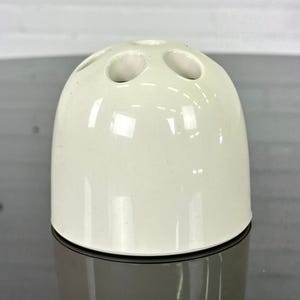 Artemide pen holder by Emma Gismondi Schweinberger
