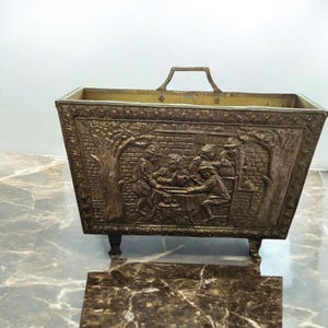 Vintage Embossed Brass and Wood Magazine Rack