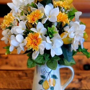 Lemons and Flowers in Lemon Pitcher