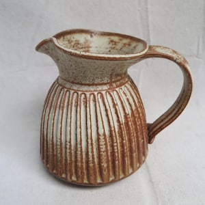 Vintage Studio Pottery Ribbed Pitcher, Incised Vase With Handle / Rusty Red Brown And Cream Glaze, Curled Lip, Signed