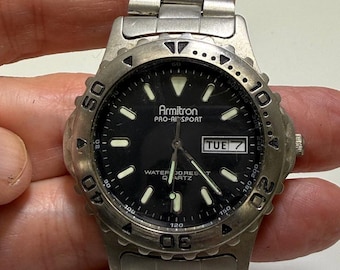 Vintage Armitron Pro-AidSport watch with a stainless steel bracelet