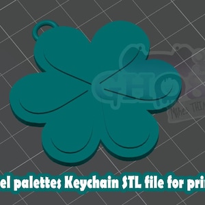 May include: A teal four-leaf clover keychain design. The image includes the text "Pastel palettes Keychain STL file for printing". The keychain has a loop at the top for attachment. The background is a gray grid.