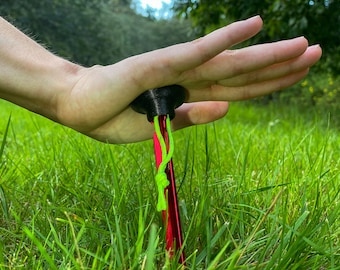 Tent peg pusher. A universal tool for easy tent stake insertion.