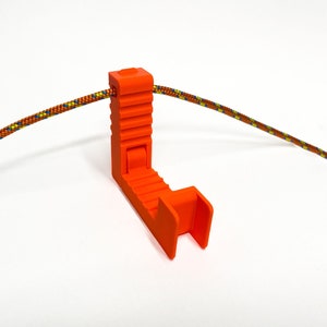 Tree Loop an ultralight hook for backpack and your gear. neon orange/orange