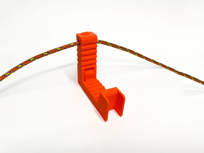 Tree Loop an ultralight hook for backpack and your gear. neon orange/orange