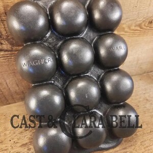 Great gift and tough to find!  1930&#39;s Fully Marked Wagner &quot;golf ball&quot; brownie pan.  Closed frame &quot;F&quot; style gem pan