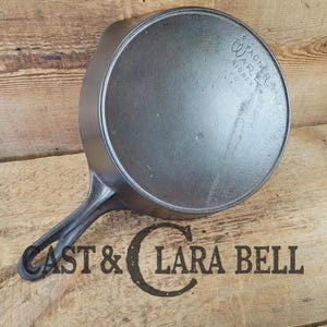 Priced to Sell!  Harder to find 1920&#39;s era Stylized logo Wagner Ware #7 Cast Iron Skillet, #7A.  Great saute skillet