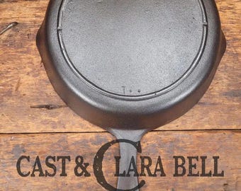 Awesome saute skillet!  1930's Era Lodge #5 Skillet with 3 Notch Heat Ring, and T and two dots marking at 6 O'Clock