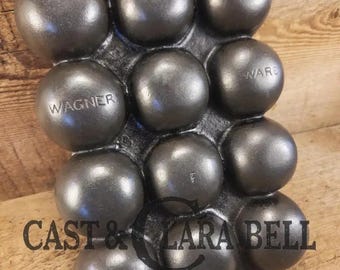 Great gift and tough to find!  1930's Fully Marked Wagner "golf ball" brownie pan.  Closed frame "F" style gem pan