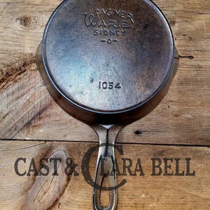 HTF!  1924 Wagner Ware #4 Cast Iron Skillet with Heat Ring, 1054.  Plating outside, black iron inside.  Beautiful patina!
