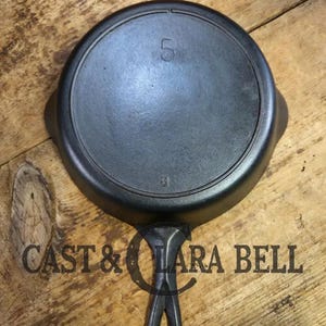 Elegant and hard working.  You have to try one of these early 1900&#39;s Lodge #5 Cast Iron Skillets, Single Notch, Raised 8 Mark.