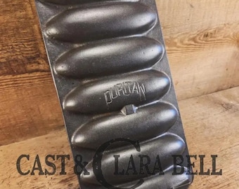 HTF 1930's Griswold made Puritan  # 1270 Wheat Stick Pan, p/n 1513. Made for Sears & Roebuck department stores.  Restored and ready to use!