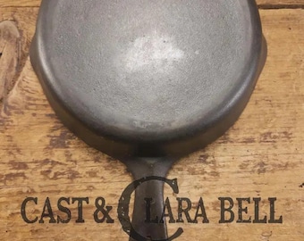 Unknown mystery egg skillet.  Really cool daily user to own and use.  Very similar to unmarked Wagner SC24