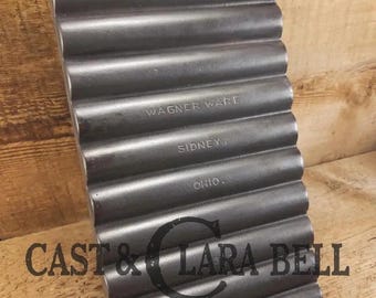 Very unique!  Wagner #22 Bread Stick Gem Pan, 1326 p/n.  Block lettering, later version.  Beautiful piece!! SC24