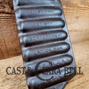 Awesome gift!  Toy Griswold Replica No. 262 Cast Iron Crispy Corn or Wheat Stick Pan, 7 cup.  Great for display or for your &quot;junior baker&quot;