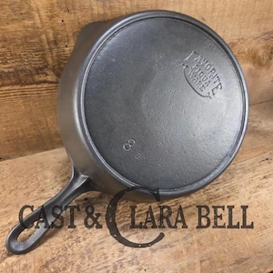 1920&#39;s Favorite Piqua Ware #8 Cast Iron Skillet with Heat Ring and Smiley Logo, 8B.  SC24