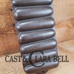 GREAT gift idea!  1930's Wagner Krusty Korn Kob Junior Stick Pan #1319.  Makes wonderful bread sticks & cornbread!