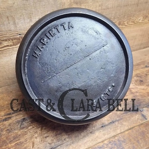 Priced to Sell!  Super unique #5 Raised letter Marietta kettle.  Repaired handle