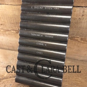 Very unique!  Wagner #22 Bread Stick Gem Pan.  "A" makers mark, "E" Gem Pan, fully restored