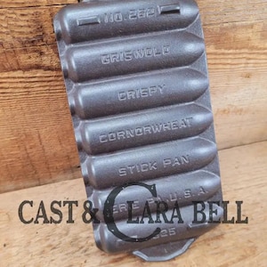 Awesome gift!  Toy Griswold No. 262 Cast Iron Crispy Corn or Wheat Stick Pan, 7 cup.  Great for display or for your &quot;junior baker&quot;