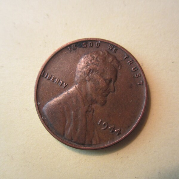 1944 US Wheat penny - no mint mark, L in Liberty touches edge