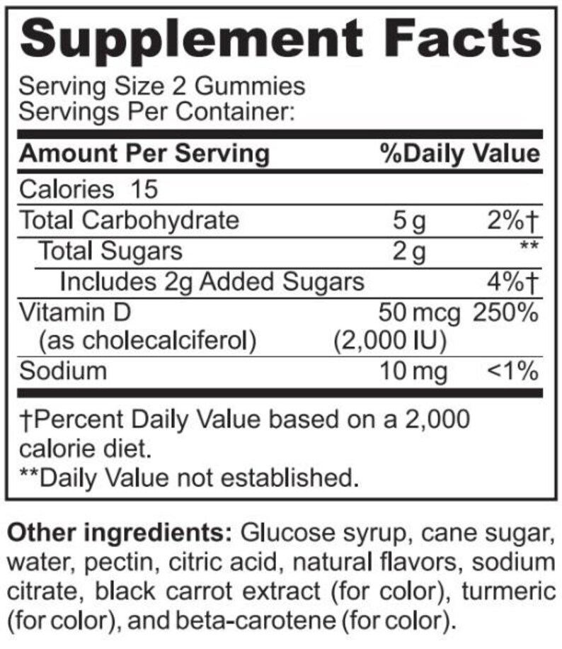 May include: A white label with black text detailing the "Supplement Facts" of a product. The label lists serving size, calories, and nutritional information, including Vitamin D content. The ingredients list includes glucose syrup, cane sugar, and natural flavors.