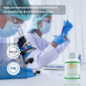 May include: A white bottle with a green label that says "Sakura Natural Health" and contains 60 capsules. The bottle is in focus, while the background is blurred and shows two people in a lab setting. The text "GMP Certified" and "FDA Inspected Facility" are visible on the bottle.