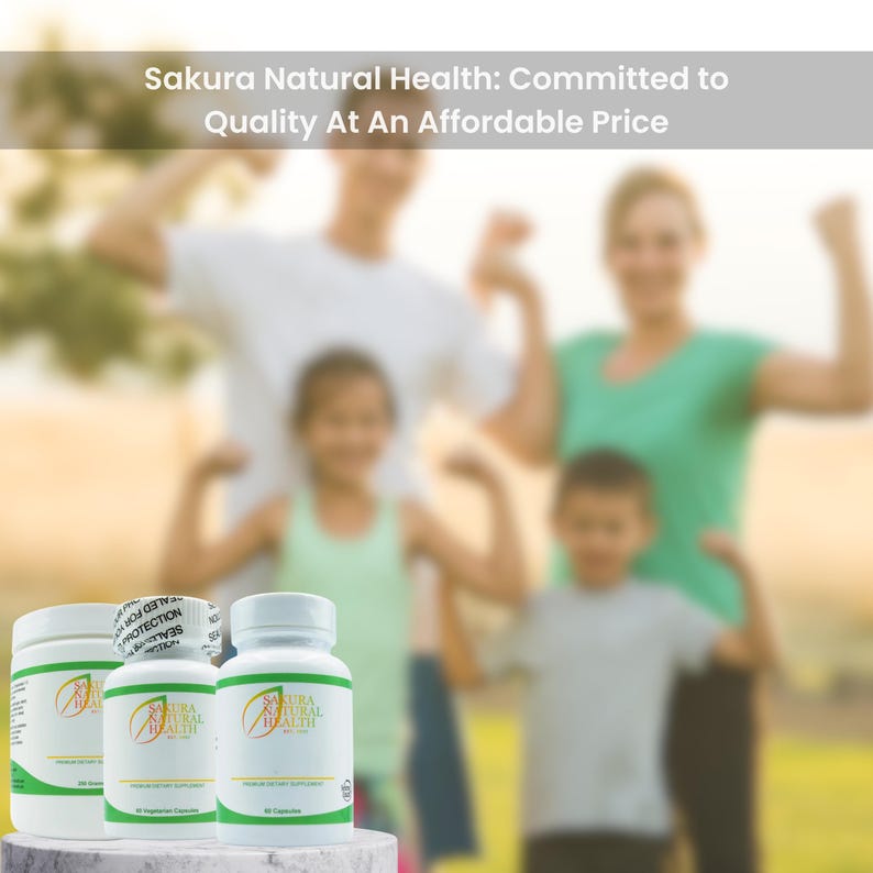 May include: Three white bottles of dietary supplements with green labels that say "Sakura Natural Health" and feature a green leaf design. The bottles are on a white surface in front of a blurred image of a family.