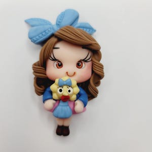 Muñeca #607 Muñeca de arcilla para centro de moños, diademas y otros proyectos de manualidades - Realizada con arcilla de porcelana fría
