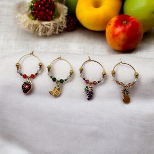 Summer themed Fruit Wine Charms - Set of 4 includes an Strawberry, Bananas, Grapes and Pineapple
