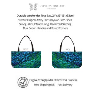May include: Durable weekender tote bag with vibrant original art by Chris Rayn. The bag measures 24" x 13" (61x33cm) and features dual cotton handles and boxed corners. The front and back of the bag display a blue and green abstract design.