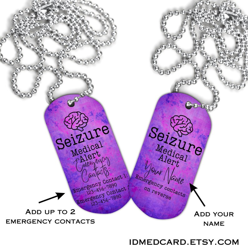 May include: Purple and pink medical alert dog tag with a brain graphic and the text "Seizure Medical Alert". The tag has a silver chain and space for two emergency contacts.