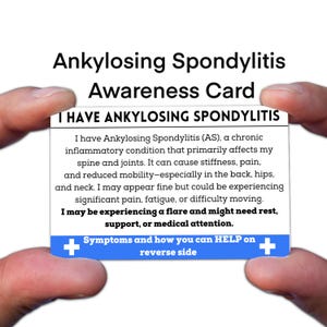 May include: A white card with the text "Ankylosing Spondylitis Awareness Card" and "I HAVE ANKYLOSING SPONDYLITIS". The card explains the condition, symptoms, and need for support. Blue plus signs are on the card.