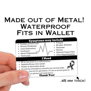 May include: Black and white medical alert card with a heart rate graphic and the text "Symptoms may include" and "I Need". The card is made of metal and is waterproof. It is .45 mm thick.