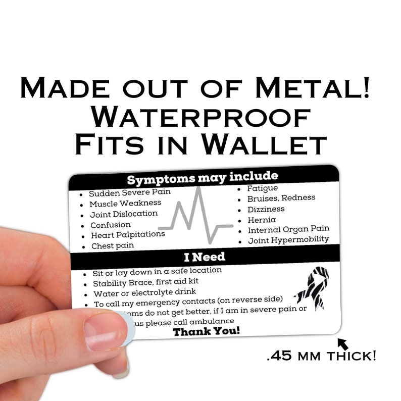 May include: Black and white medical alert card with a heart rate graphic and the text "Symptoms may include" and "I Need". The card is made of metal and is waterproof. It is .45 mm thick.