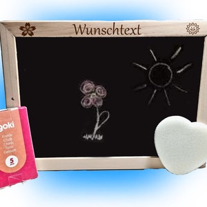 Drawing board with chalk and sponge
