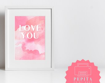 May include: A white framed print with a pink watercolor background and the text "LOVE YOU" in white.
